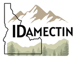 Idamectin transparent logo with Outline of Idaho with mountains and trees, featuring the brand 'IDamectin'.